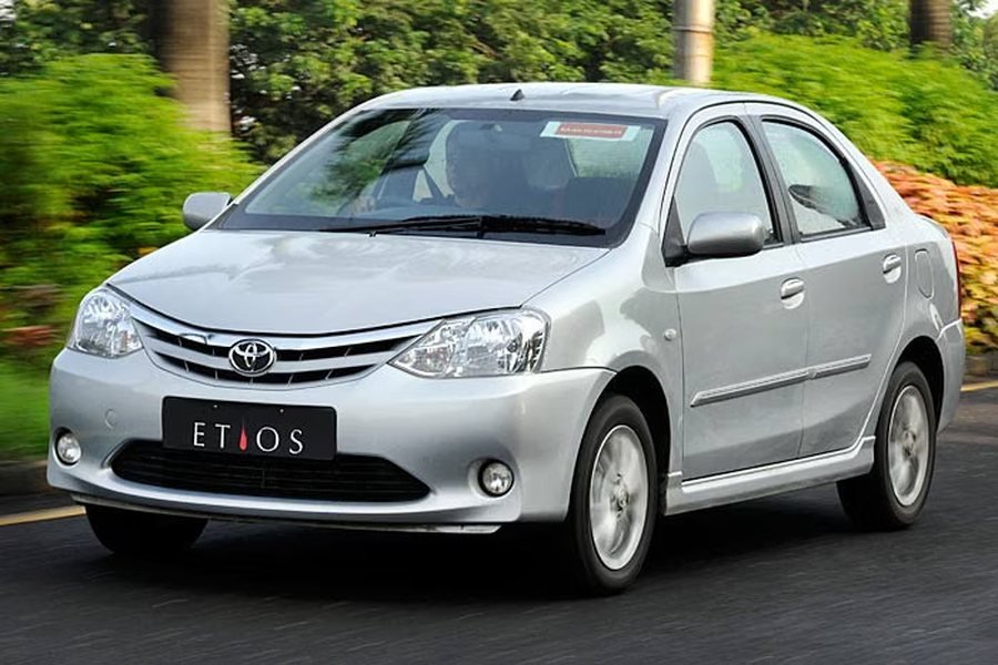Silver Toyota Etios sedan taxi available for hire in Mangalore